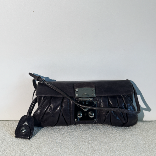 Grey Matelassé Leather Pushlock Clutch